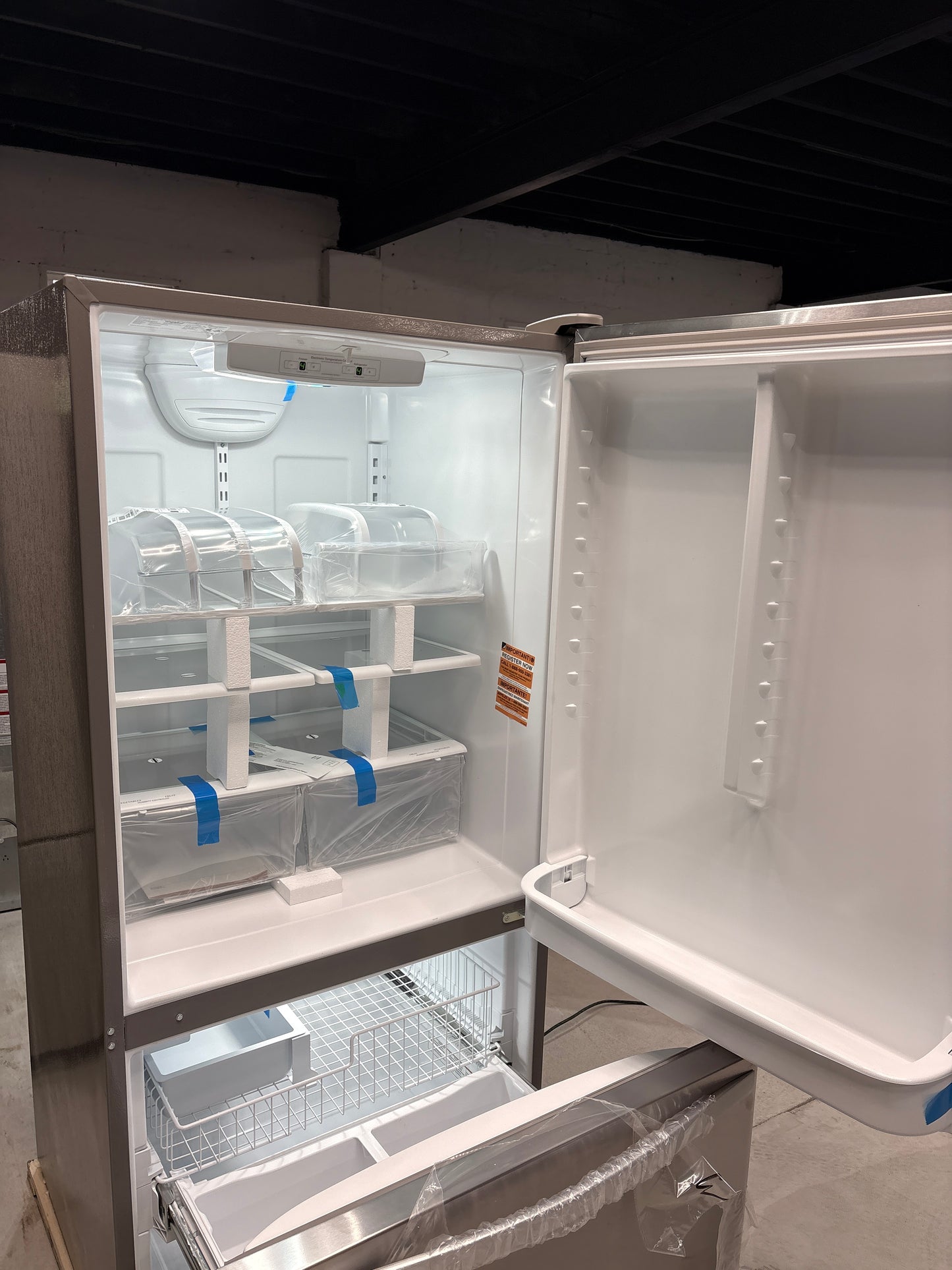 Whirlpool - 22 cu. ft. Bottom Freezer Refrigerator in Stainless Steel with Spill Guard Glass Shelves