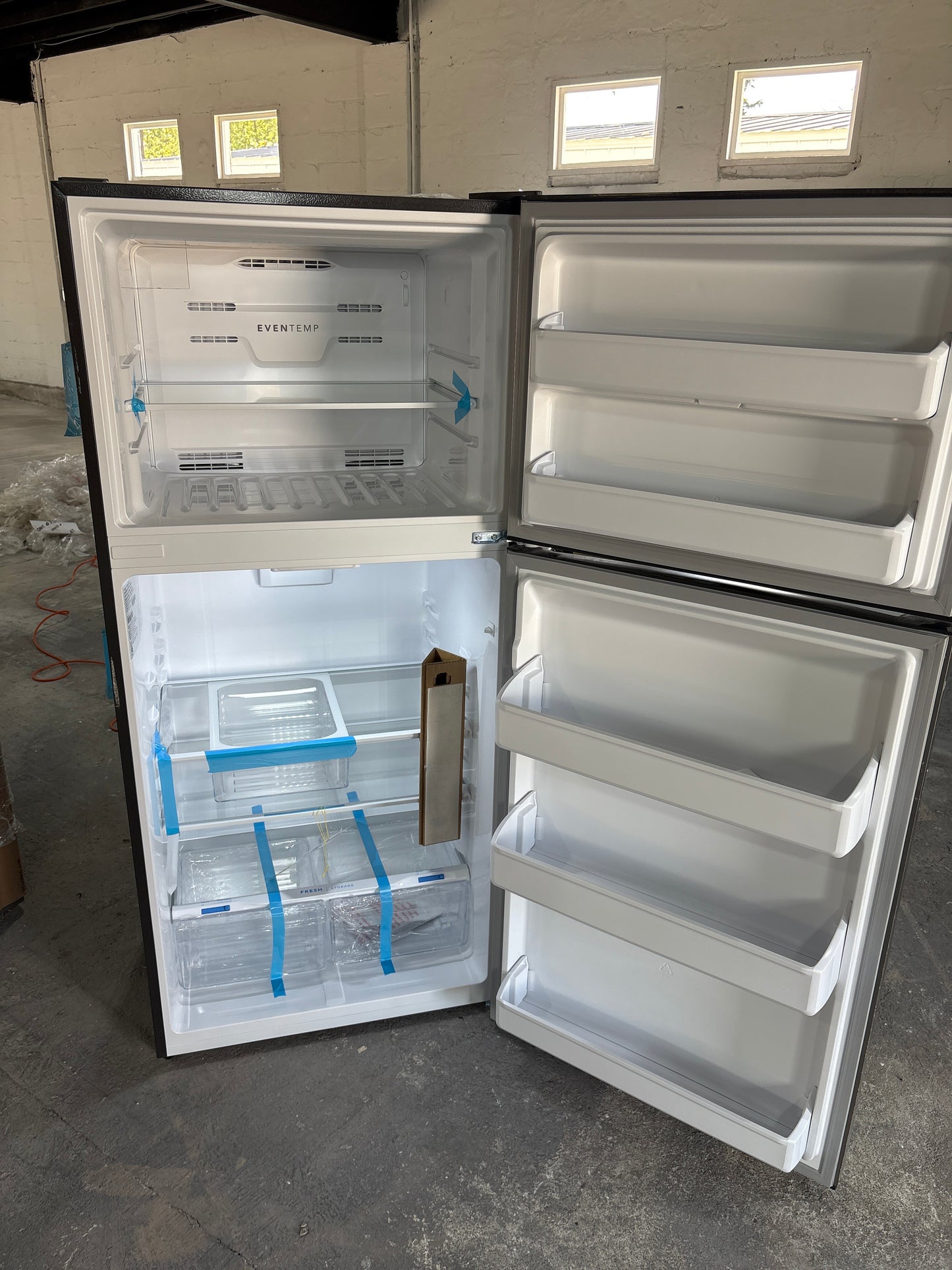 Frigidaire 18 Cu. Ft. Garage Ready Top Freezer Refrigerator Scratch & Dent WCA209 - FRTE1835AV