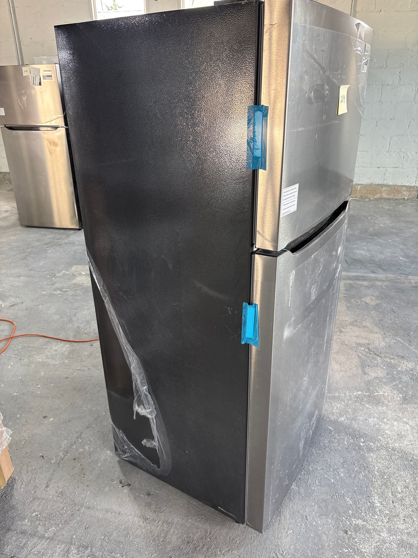 Frigidaire 18 Cu. Ft. Garage Ready Top Freezer Refrigerator Scratch & Dent WCA209 - FRTE1835AV